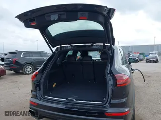 2017 Porsche Cayenne with VIN WP1AA2A2XHKA90706, listed as a IAAI auction lot 41692768 with 92,800 mi miles. Bid and sale history available at carsss.com. Image 18.