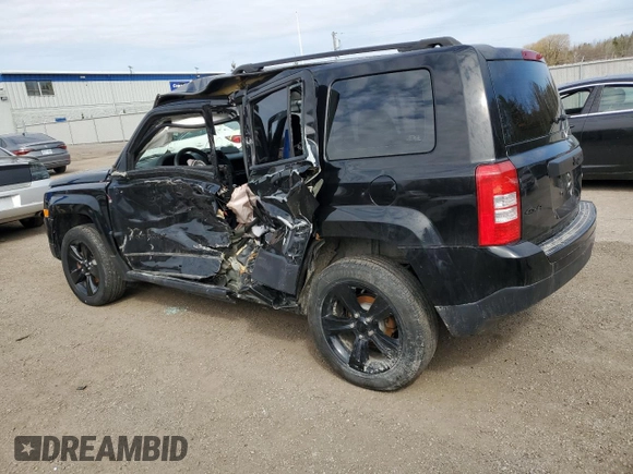 2015 Jeep Patriot High Altitude with VIN 1C4NJRAB0FD392874, listed as a Copart auction lot 52767375 with 134,522 mi miles and Salvage Title. Bid and sale history available at DreamBid. Image 2.