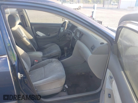 2005 Toyota Corolla CE with VIN 1NXBR32E25Z563569, listed as a IAAI auction lot 42100384 with 243,610 mi miles and . Bid and sale history available at DreamBid. Image 5.