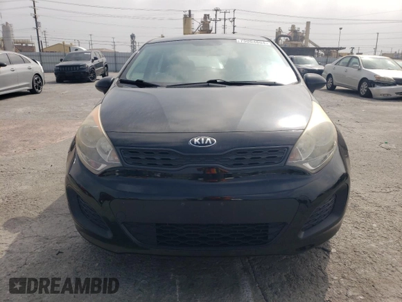 2014 Kia Rio LX with VIN KNADM5A35E6409088, listed as a Copart auction lot 75004804 with 111,664 mi miles and Salvage Title. Bid and sale history available at carsss.com. Image 5.