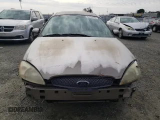 2004 Ford Taurus SE with VIN 1FAFP53U34G129631, listed as a Copart auction lot 45054375 with 182,089 mi miles and Salvage title. Bid and sale history available at DreamBid. Image 5.