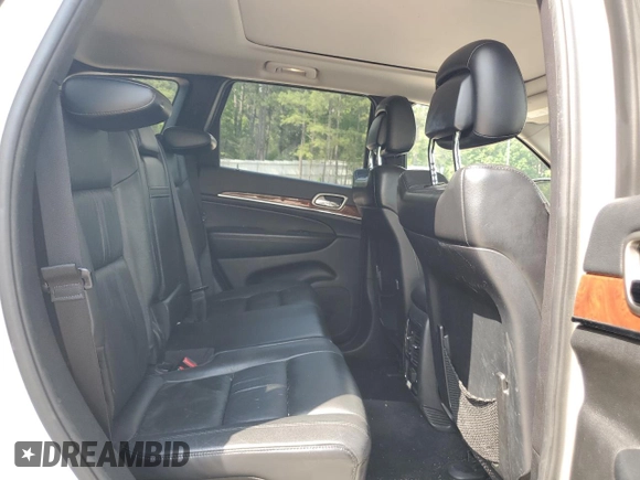 2012 Jeep Grand Cherokee Limited z VIN 1C4RJFBT0CC287342, wystawiony jako Copart lot #57000525 z przebiegiem 135 655 mil mil oraz Szkoda całkowita • Salvage title. Historia ofert i sprzedaży dostępna na DreamBid. Obrazek 11.