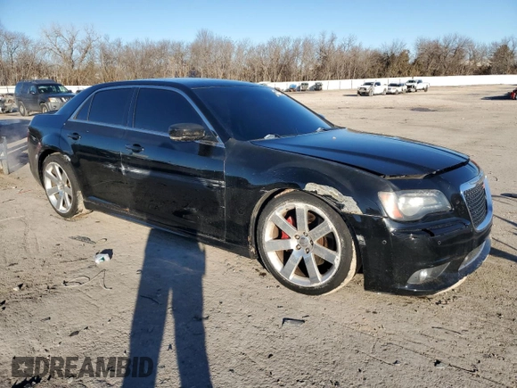 2012 Chrysler 300 SRT8 with VIN 2C3CCAFJ0CH800893, listed as a Copart auction lot 88352515 with 143,381 mi miles and Salvage Title. Bid and sale history available at carsss.com. Image 4.