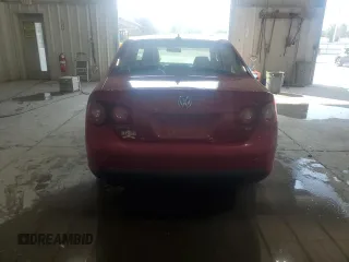 2009 Volkswagen Jetta SE z VIN 3VWRZ71KX9M127514, wystawiony jako Copart lot #59872955 z przebiegiem Nie podano mil oraz Szkoda całkowita • Salvage title. Historia ofert i sprzedaży dostępna na DreamBid. Obrazek 6.