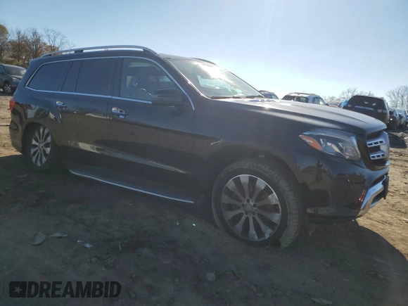 2017 Mercedes-Benz GLS 450 with VIN 4JGDF6EE1HA758051, listed as a Copart auction lot 77735103 with 113,748 mi miles and . Bid and sale history available at DreamBid. Image 4.
