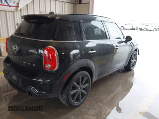 2014 MINI Countryman S z VIN WMWZC5C59EWP36617, wystawiony jako IAAI lot #41550024 z przebiegiem 102 860 mil mil oraz . Historia ofert i sprzedaży dostępna na DreamBid. Obrazek 4.