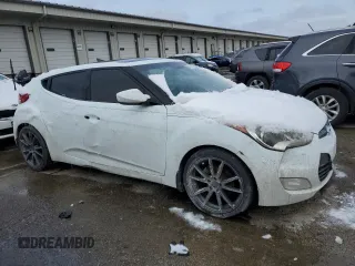 2012 Hyundai Veloster w/Red Int with VIN KMHTC6AD5CU030340, listed as a Copart auction lot 45793405 with 139,667 mi miles and Clean title. Bid and sale history available at DreamBid. Image 4.
