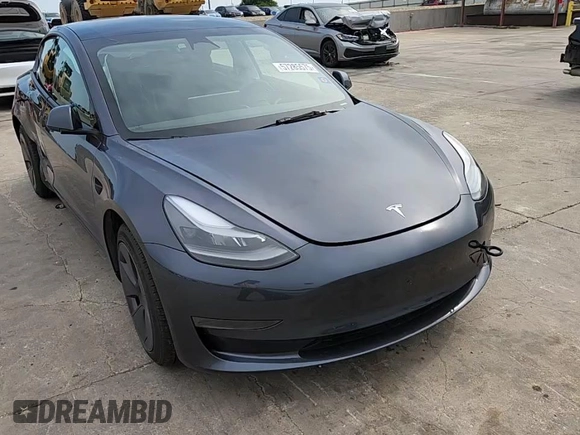 2023 Tesla Model 3 with VIN 5YJ3E1EA1PF468627, listed as a Copart auction lot 57285575 with 5,952 mi miles and Salvage title. Bid and sale history available at DreamBid. Image 13.