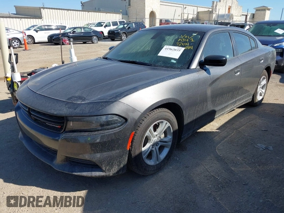 2023 Dodge Charger SXT with VIN 2C3CDXBG1PH630916, listed as a IAAI auction lot 41962035 with 41,818 mi miles and . Bid and sale history available at DreamBid. Image 2.