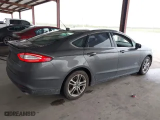 2016 Ford Fusion Energi Titanium with VIN 3FA6P0SU9GR103245, listed as a IAAI auction lot 41888435 with 123,975 mi miles. Bid and sale history available at carsss.com. Image 4.