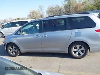 2013 Toyota Sienna LE AAS with VIN 5TDKK3DC6DS371126, listed as a IAAI auction lot 42006353 with 141,425 mi miles. Bid and sale history available at carsss.com. Image 14.