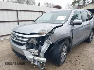 2018 Honda Pilot EX-L with VIN 5FNYF5H54JB006773, listed as a IAAI auction lot 41534534 with 131,570 mi miles. Bid and sale history available at carsss.com. Image 6.