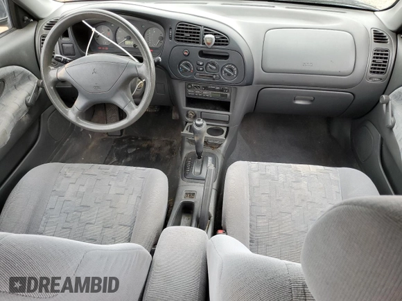 1998 Mitsubishi Mirage DE с VIN JA3AY26A7WU020867, выставлен на аукционе Copart как лот 83889944 с пробегом 203 983 миль миль и Списание • Salvage title. История ставок и продаж доступна на DreamBid. Изображение 8.