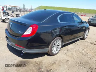 2014 Lincoln MKS with VIN 1LNHL9DK0EG600330, listed as a IAAI auction lot 41953968 with 228,668 mi miles. Bid and sale history available at carsss.com. Image 4.