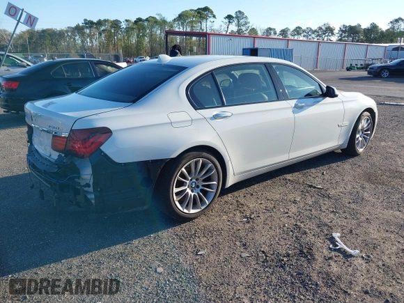 2014 BMW 7 Series ALPINA B7 with VIN WBAYE8C59ED134562, listed as a IAAI auction lot 41806222 with 120,043 mi miles. Bid and sale history available at carsss.com. Image 4.