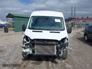 2021 Ford Transit Cargo Van with VIN 1FTBR2C81MKA02605, listed as a IAAI auction lot 41804703 with 94,481 mi miles. Bid and sale history available at carsss.com. Image 12.