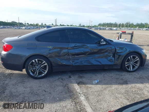 2014 BMW 4 Series 428i xDrive with VIN WBA3N5C57EK196790, listed as a IAAI auction lot 40571670 with 108,114 mi miles and . Bid and sale history available at DreamBid. Image 13.