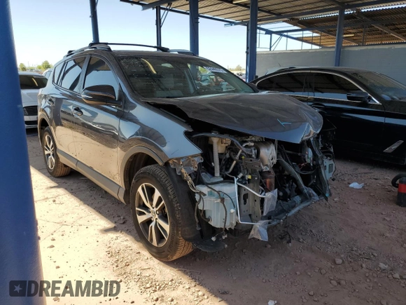2018 Toyota RAV4 XLE with VIN JTMWFREV5JJ180198, listed as a Copart auction lot 52440575 with 43,707 mi miles and Salvage Title. Bid and sale history available at DreamBid. Image 4.