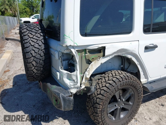 2020 Jeep Wrangler Unlimited Sahara with VIN 1C4HJXEN4LW330867, listed as a IAAI auction lot 41790709 with 63,151 mi miles. Bid and sale history available at carsss.com. Image 6.