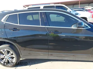 2019 BMW X2 sDrive28i with VIN WBXYJ3C50KEP77327, listed as a IAAI auction lot 40922194 with 94,672 mi miles. Bid and sale history available at carsss.com. Image 14.