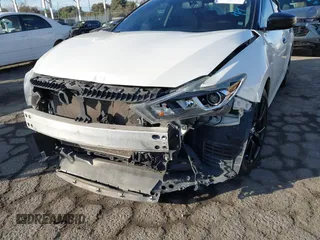 2017 Nissan Maxima SV with VIN 1N4AA6APXHC392355, listed as a IAAI auction lot 41153272 with 83,384 mi miles and . Bid and sale history available at DreamBid. Image 6.
