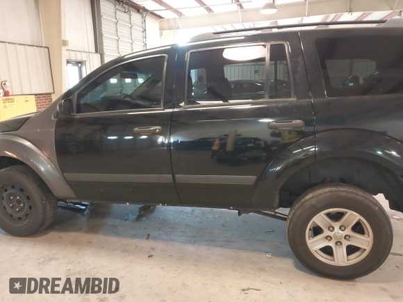 2006 Dodge Durango SXT with VIN 1D4HD38K16F129744, listed as a IAAI auction lot 41006004 with 237,951 mi miles and . Bid and sale history available at DreamBid. Image 14.