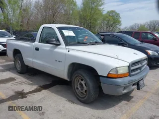 2001 Dodge Dakota with VIN 1B7FL26XX1S249462, listed as a IAAI auction lot 42003993 with 228,398 mi miles. Bid and sale history available at carsss.com. Image 1.