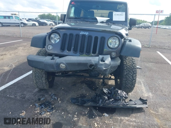 2016 Jeep Wrangler Unlimited Sport with VIN 1C4BJWDG7GL329660, listed as a IAAI auction lot 42482861 with 115,622 mi miles and . Bid and sale history available at DreamBid. Image 12.