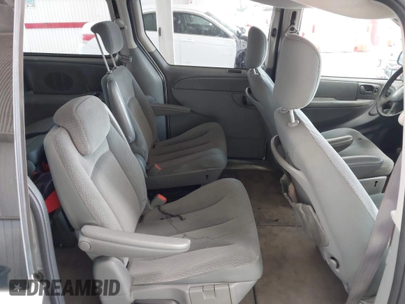 2005 Dodge Caravan SXT with VIN 2D4GP44L65R335656, listed as a IAAI auction lot 42526728 with 322,176 mi miles and . Bid and sale history available at DreamBid. Image 8.