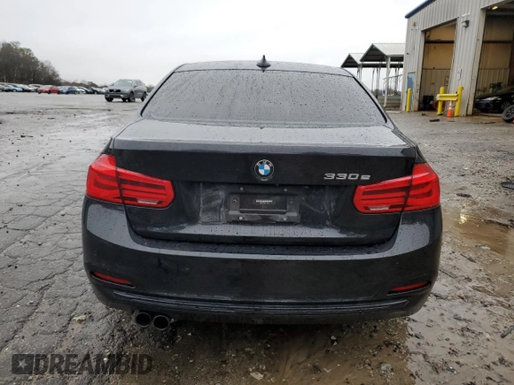 2018 BMW 3 Series 330e iPerformance with VIN WBA8E1C59JA177947, listed as a Copart auction lot 44696215 with 69,231 mi miles and Salvage Title. Bid and sale history available at carsss.com. Image 6.
