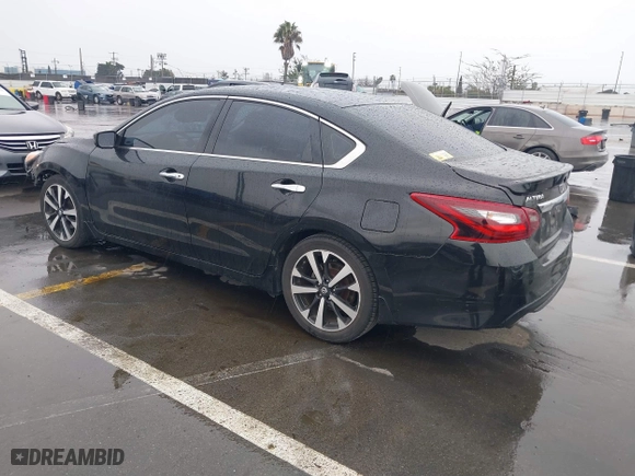 2018 Nissan Altima 2.5 SV with VIN 1N4AL3AP9JC117719, listed as a IAAI auction lot 41720521 with 103,541 mi miles. Bid and sale history available at carsss.com. Image 3.
