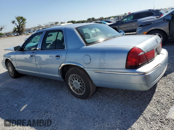 1999 Mercury Grand Marquis GS z VIN 2MEFM74W5XX711421, wystawiony jako Copart lot #53062605 z przebiegiem 106 913 mil mil oraz Nie do naprawy • Non repairable. Historia ofert i sprzedaży dostępna na DreamBid. Obrazek 2.
