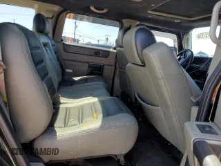 2003 Hummer H2 with VIN 5GRGN23U73H122529, listed as a Copart auction lot 50157934 with 0 mi miles and Salvage Title. Bid and sale history available at carsss.com. Image 10.