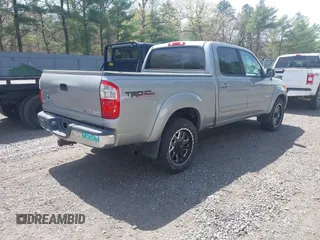 2004 Toyota Tundra SR5 with VIN 5TBDT44174S434897, listed as a IAAI auction lot 42128806 with 218,054 mi miles and . Bid and sale history available at DreamBid. Image 4.