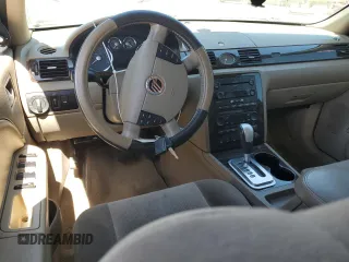 2005 Mercury Montego Luxury z VIN 1MEFM40155G626347, wystawiony jako Copart lot #46715235 z przebiegiem 213 883 mil mil oraz Szkoda całkowita • Salvage title. Historia ofert i sprzedaży dostępna na DreamBid. Obrazek 8.