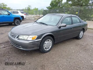2000 Toyota Camry CE z VIN JT2BG22K3Y0530823, wystawiony jako IAAI lot #42365050 z przebiegiem 148 913 mil mil oraz . Historia ofert i sprzedaży dostępna na DreamBid. Obrazek 2.