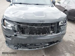 2018 Jeep Grand Cherokee Laredo E with VIN 1C4RJFAG0JC267822, listed as a IAAI auction lot 40876905 with 136,491 mi miles. Bid and sale history available at carsss.com. Image 11.