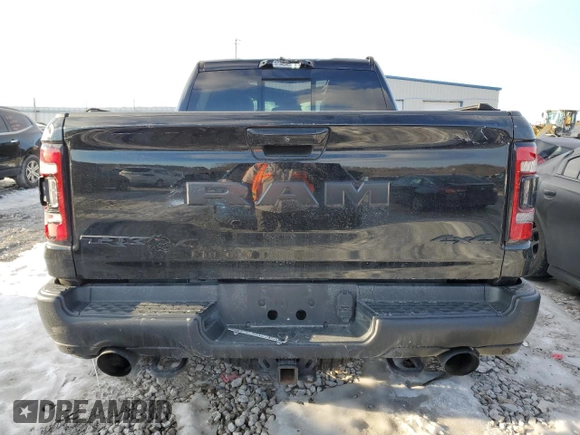 2021 Ram 1500 TRX with VIN 1C6SRFU9XMN704748, listed as a Copart auction lot 89356555 with 104,286 mi miles and Salvage Title. Bid and sale history available at carsss.com. Image 6.