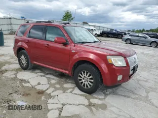 2009 Mercury Mariner Premier with VIN 4M2CU97G39KJ11050, listed as a Copart auction lot 57131665 with 201,602 mi miles and Salvage title. Bid and sale history available at DreamBid. Image 4.