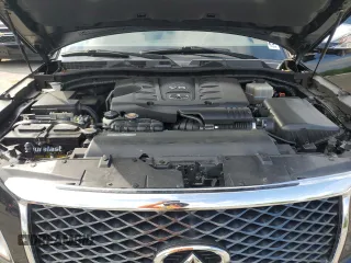 2015 Infiniti QX80 with VIN JN8AZ2NF7F9572565, listed as a Copart auction lot 58494415 with 122,609 mi miles and Salvage title. Bid and sale history available at DreamBid. Image 12.