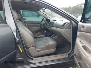 2004 Toyota Camry LE with VIN 4T1BE30K24U921028, listed as a IAAI auction lot 42187174 with 295,174 mi miles and . Bid and sale history available at DreamBid. Image 5.
