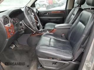 2006 GMC Envoy SLE z VIN 1GKET16S566124495, wystawiony jako Copart lot #58792765 z przebiegiem 186 867 mil mil oraz Czysty tytuł • Clean title. Historia ofert i sprzedaży dostępna na DreamBid. Obrazek 7.