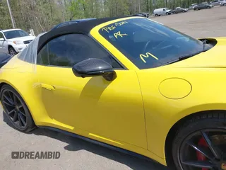 2022 Porsche 911 Carrera S z VIN WP0CB2A92NS245314, wystawiony jako IAAI lot #42086408 z przebiegiem 29 193 mil mil oraz . Historia ofert i sprzedaży dostępna na DreamBid. Obrazek 13.
