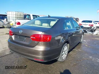 2014 Volkswagen Jetta Sedan SE w/Connectivity with VIN 3VWD07AJ1EM361255, listed as a IAAI auction lot 41385849 with 166,124 mi miles. Bid and sale history available at carsss.com. Image 4.