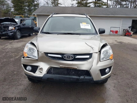 2009 Kia Sportage LX with VIN KNDJE723397628211, listed as a IAAI auction lot 41744526 with 136,811 mi miles. Bid and sale history available at carsss.com. Image 12.