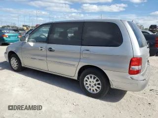 2003 Kia Sedona LX with VIN KNDUP131236453481, listed as a Copart auction lot 75660244 with 125,628 mi miles and Salvage Title. Bid and sale history available at carsss.com. Image 2.