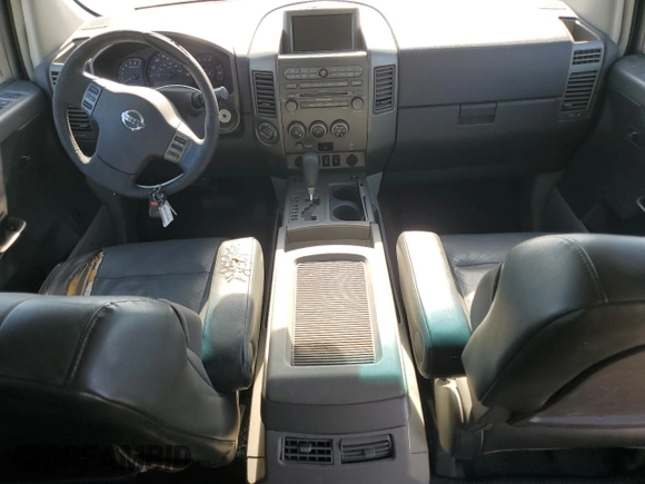 2004 Nissan Titan LE z VIN 1N6AA07B64N525238, wystawiony jako Copart lot #60370775 z przebiegiem Nie podano mil oraz Czysty tytuł • Clean title. Historia ofert i sprzedaży dostępna na DreamBid. Obrazek 8.