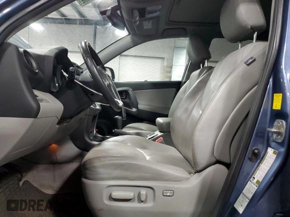 2010 Toyota RAV4 Limited with VIN 2T3DF4DV2AW028019, listed as a Copart auction lot 60052535 with 123,243 mi miles and Salvage title. Bid and sale history available at DreamBid. Image 7.