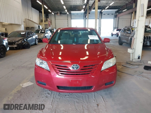 2007 Toyota Camry CE z VIN 4T4BE46K37R004090, wystawiony jako IAAI lot #42028376 z przebiegiem 110 803 mil mil oraz . Historia ofert i sprzedaży dostępna na DreamBid. Obrazek 13.