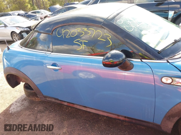 2013 MINI Coupe S with VIN WMWSX3C55DT466604, listed as a IAAI auction lot 42033723 with 109,814 mi miles and . Bid and sale history available at DreamBid. Image 12.